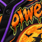 Close-up of the orange and green Halloween print on the black polyester jersey fabric