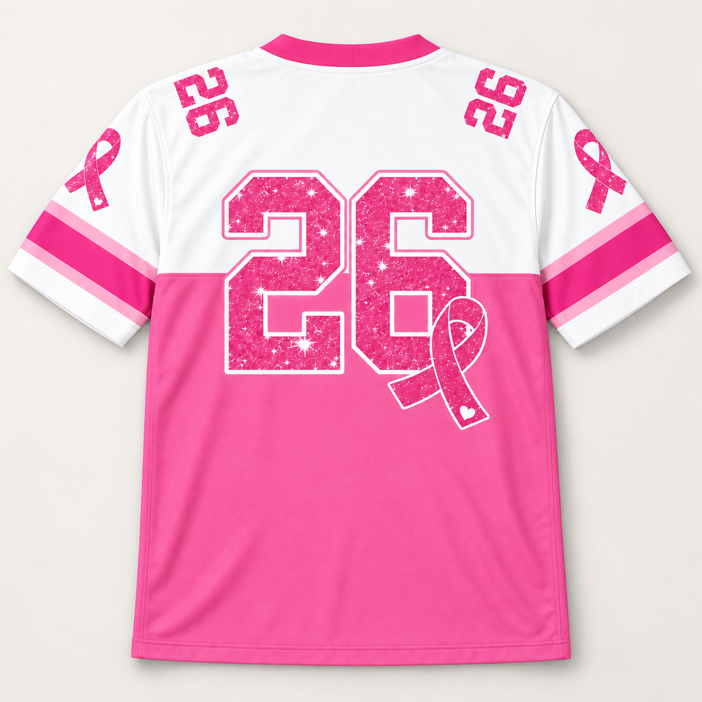 Back view with a large pink number 26 and an awareness ribbon