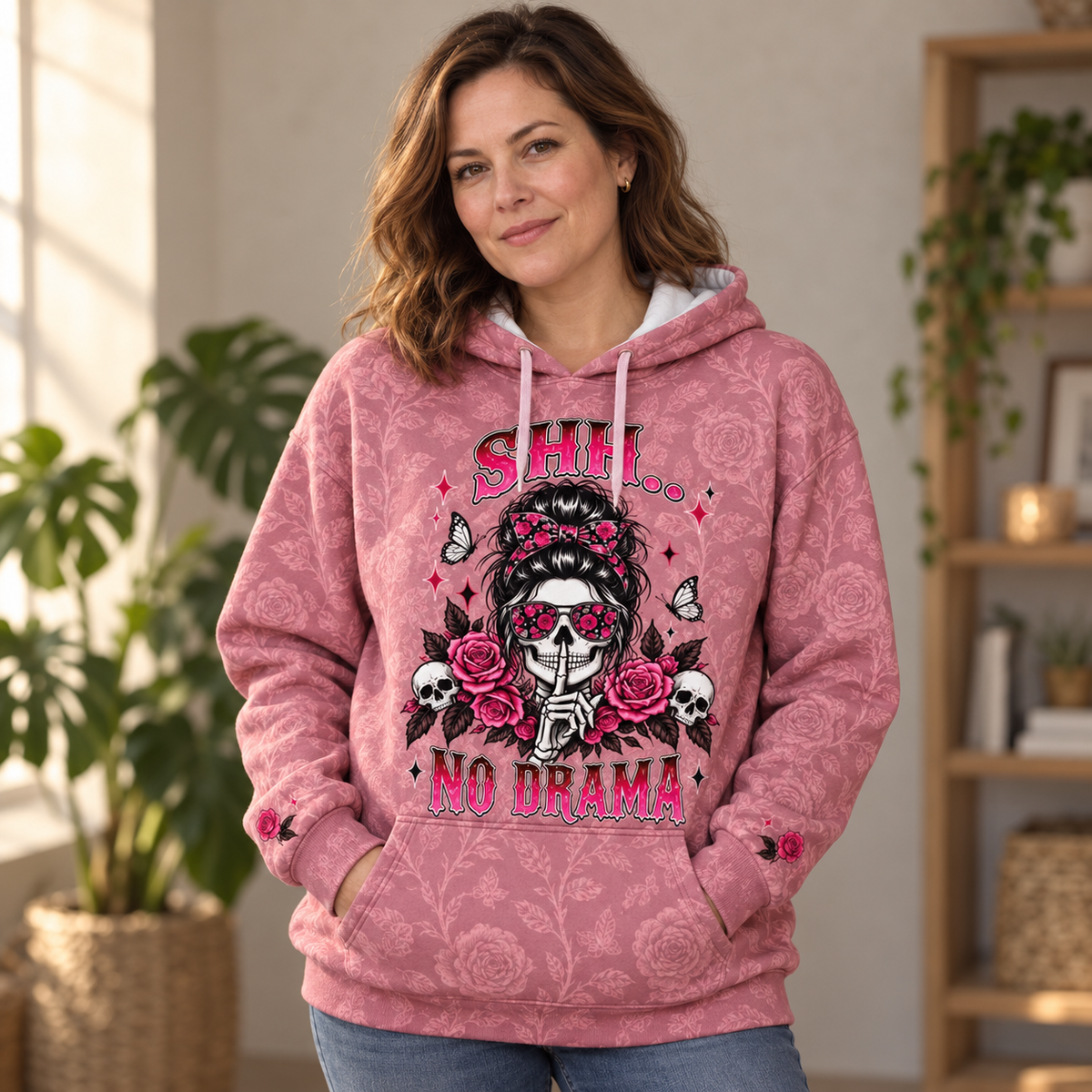 Woman wearing the dusty rose Shh No Drama hoodie