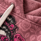 Close-up of the brushed fleece fabric and rose print on the dusty rose hoodie
