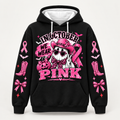 Black all-over print hoodie, front view, In October We Wear Pink with a pink cowgirl ghost and awareness ribbon