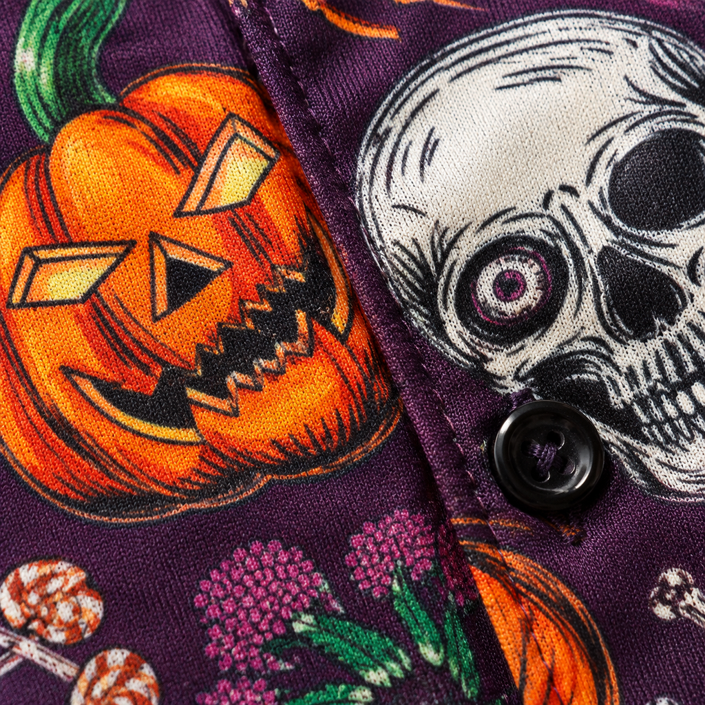 Close-up of the printed fabric and button on the Halloween Hawaiian shirt