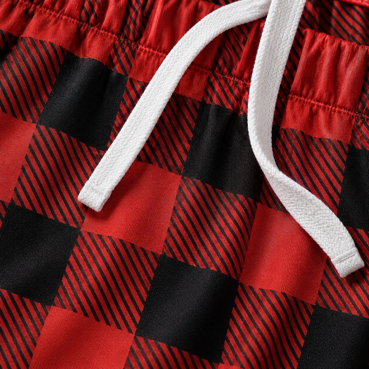 Red buffalo plaid jersey fabric and drawstring close-up