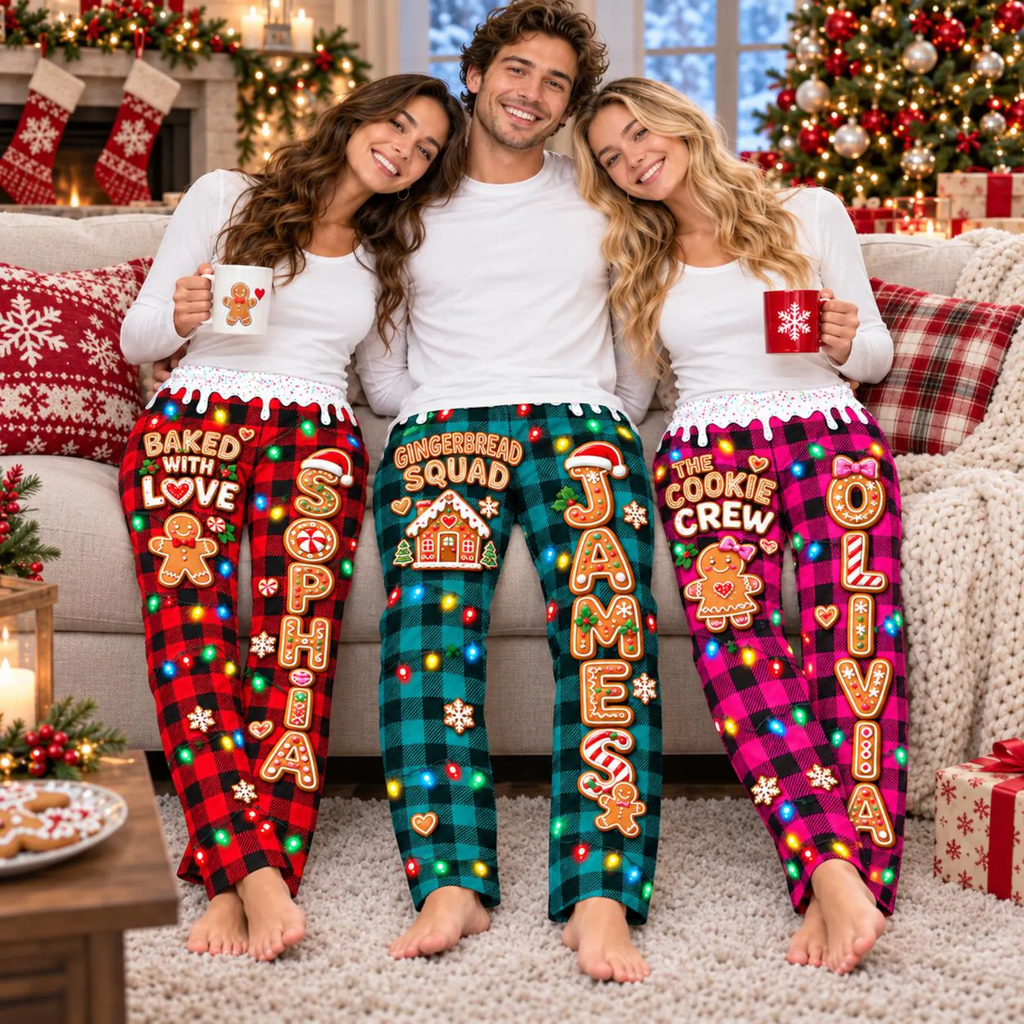 Family on the couch in custom name gingerbread plaid pajama pants