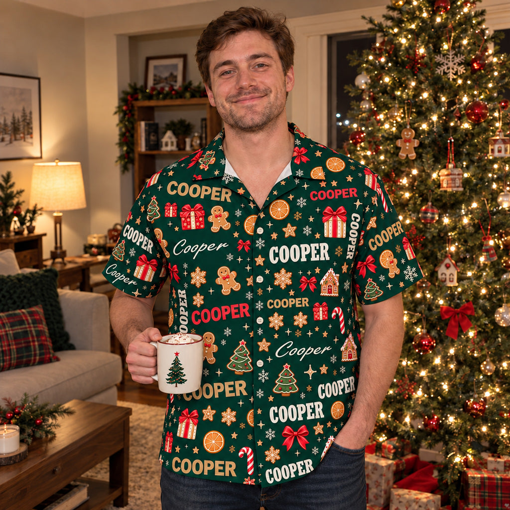 Man wearing the Design 2 shirt by the Christmas tree