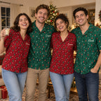 Four friends in matching personalized Christmas tree Hawaiian shirts, red and green, each with a name on the chest